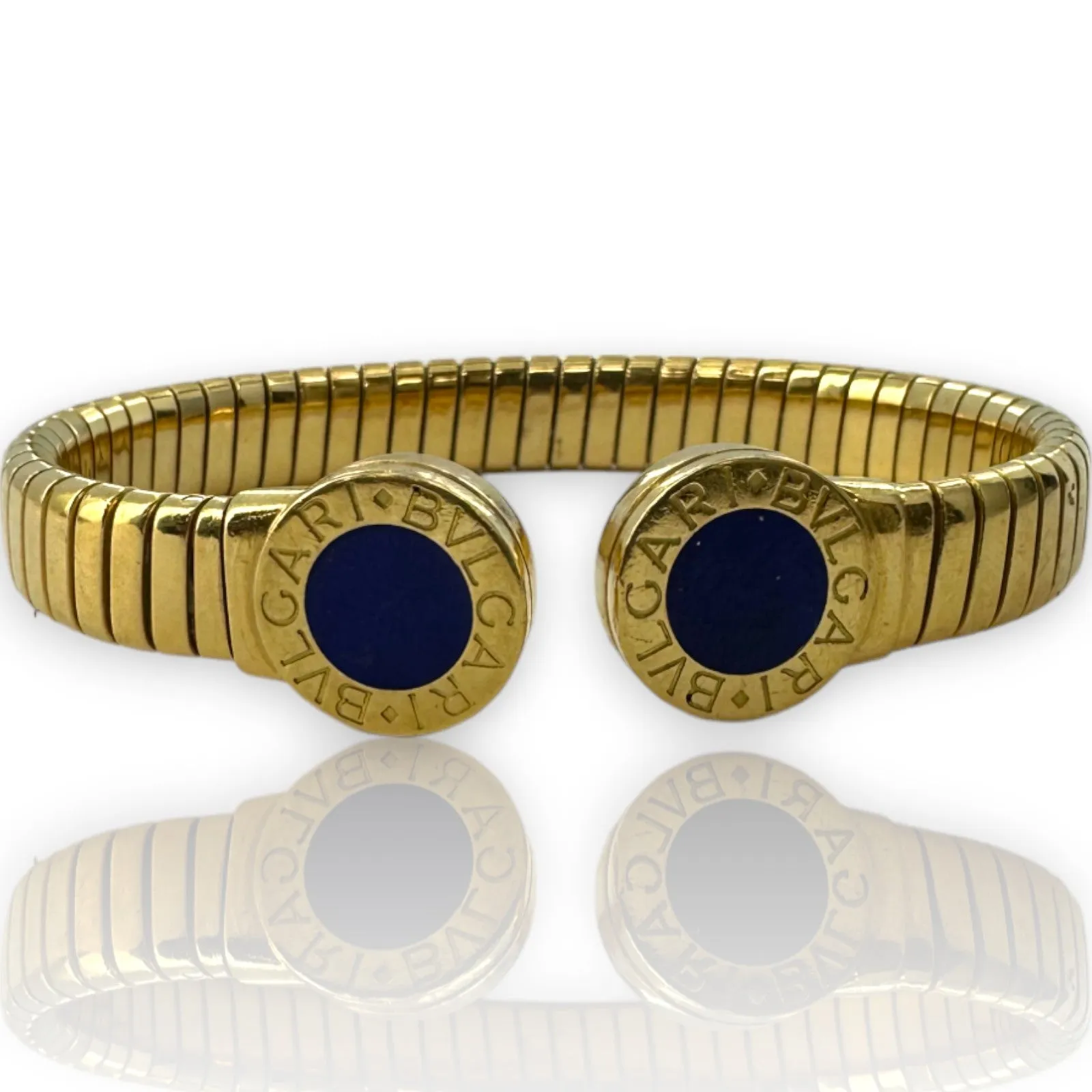 BVLGARI Bulgari 18kt Yellow Gold Tubogas Bracelet Flexible Cuff with Inlaid Lapis Lazuli Made in Italy